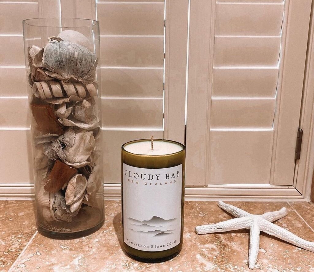 A woman who lost her job turned leftover bottles into luxury candles launching a kitchen table side hustle that grew to £5,000 a month and even £8,000 profit at Christmas transforming her career.